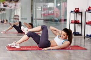 Woman Working Out Abs Crunches